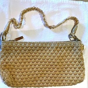 Gold evening bag by The Sak.